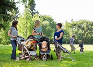 Mothers in a park. (Tyler Olson/Shutterstock)